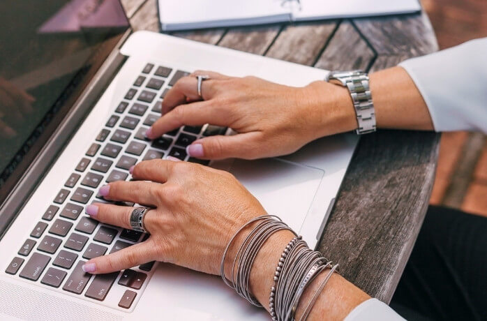 person using MacBook 