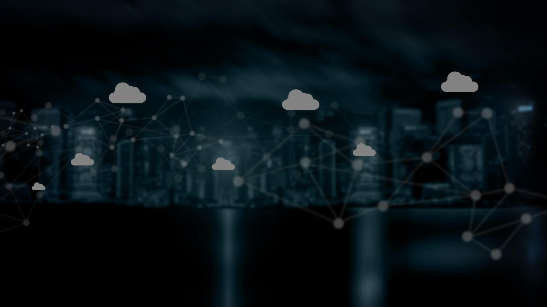 white clouds over a city skyline
