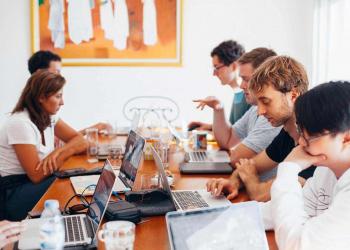 agile teams working in a room together