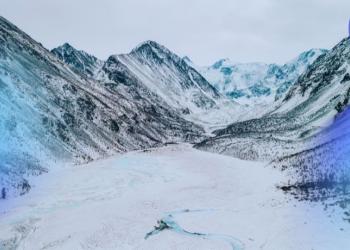 A Breathtaking View of Snow Covered Mountains⁠ by Mikhail Nilov