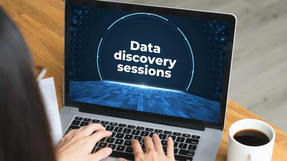 professional accessing data analytics session on her computer