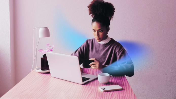 black woman typing on computer
